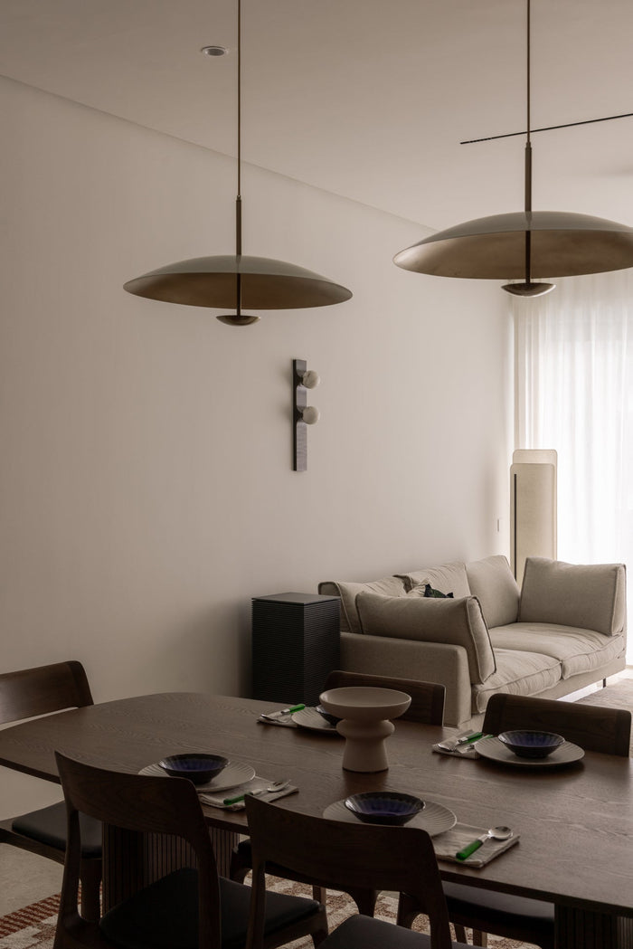 Completed Kuala Lumpur home with the dining table and living area designed as one connected space