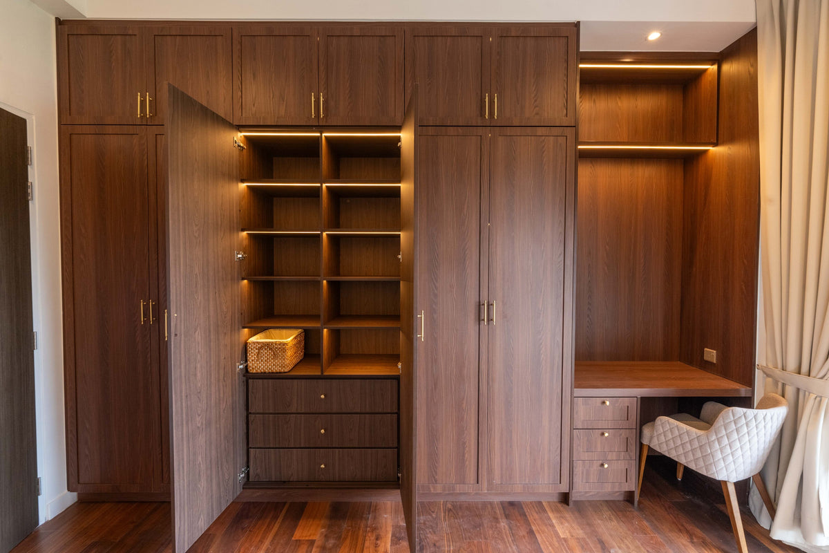 USJ bedroom with a full-height fitted walnut wardrobe and built-in study nook