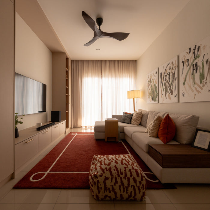 A finished Klang Valley living room with warm layered textiles